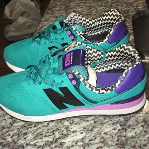 One pair of new balance 574 slightly wore excellent condition